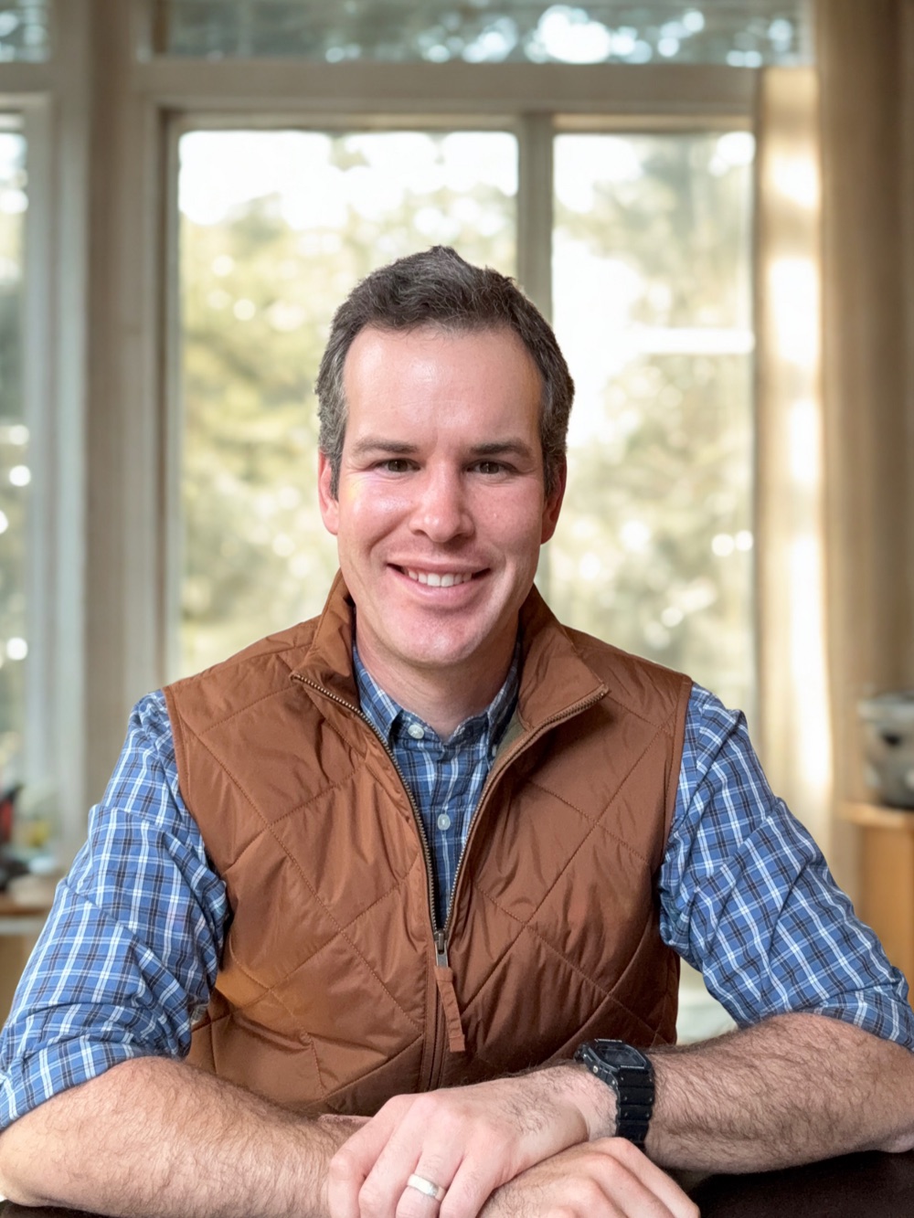Clint, founder of Cascade, seated at a table